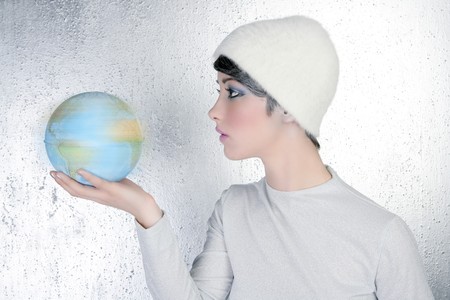 fashion modern silver woman holding global map winter hatの写真素材