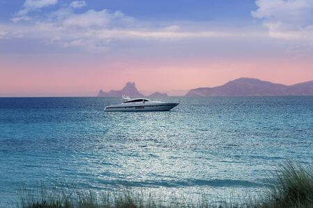 silver turquoise Illetes Formentera sea sunset magic evening light 