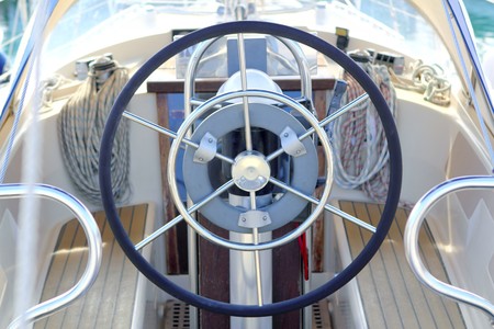 boat rudder wheel white sailboat detail beautiful yachtの写真素材