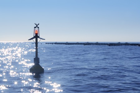 fish farm on blue ocean sea horizon piscicultureの写真素材