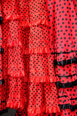 Gipsy red spots dress texture background typical from Andalusia Spainの写真素材