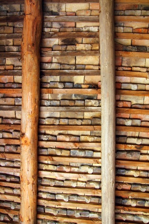 Clay square roof tiles ceiling indoor wooden beams view in Pyreneesの写真素材