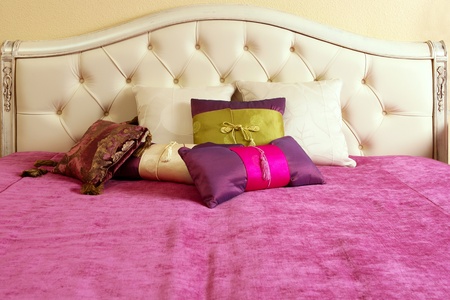 diamond upholstery buttons bed head pink blanket colorful pillowsの写真素材
