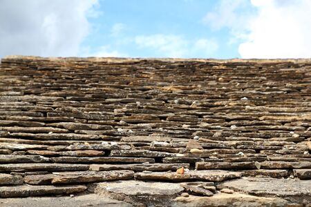 slate stone roof tiles outside view focus on foregroundの写真素材