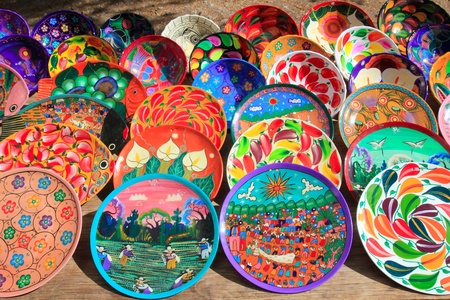 clay ceramic plates from Mexico colorful traditional handcraftの写真素材