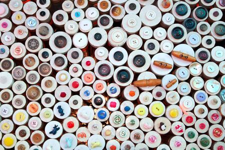 buttons in haberdashery retail shop colorful pattern backgroundの写真素材