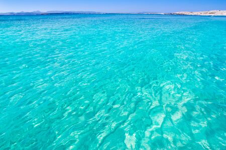 beach with perfect white sand and turquoise water balearic islands in Spainの写真素材