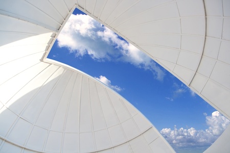 astronomical observatory indoor white dome blue sky windowの写真素材