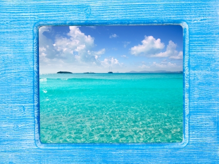 blue wood border frame with Ibiza Formentera beachの写真素材