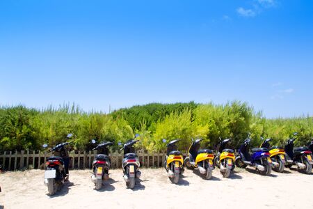 Formentera scooter bikes parking near the beach in Spainのeditorial素材