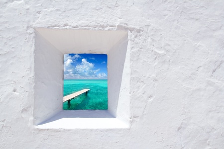 Ibiza mediterranean white wall window with Formentera beach view