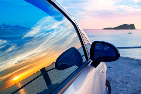 Ibiza cala Conta Conmte susnset reflection y car window glassの写真素材