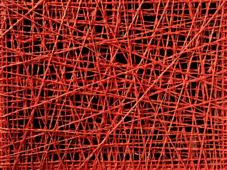 abstract red thread texture with irregular crossed linesの写真素材