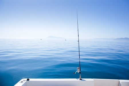 boat fishing rod in mediterranean blue sea in Spainの写真素材