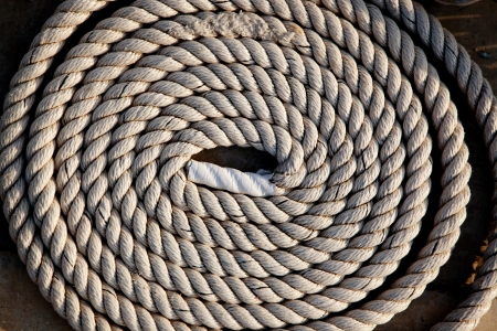 coil of marine rope detail in marina portの写真素材