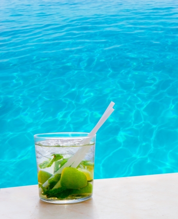 Mojito cocktail on a perfect tropical beach with turquoise waterの写真素材