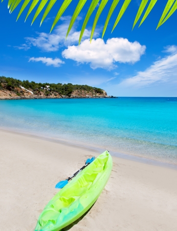 Cala Llenya in Ibiza kayak with turquoise water in Balearic islandsの写真素材