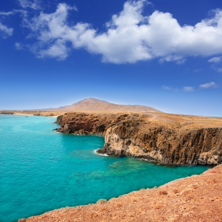 Lanzarote Papagayo turquoise beach and Ajaches in Canary Islandsの写真素材