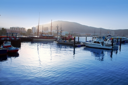 Los Cristianos harbor port sailboat sunrise in Adeje coast Arona Tenerifeの写真素材