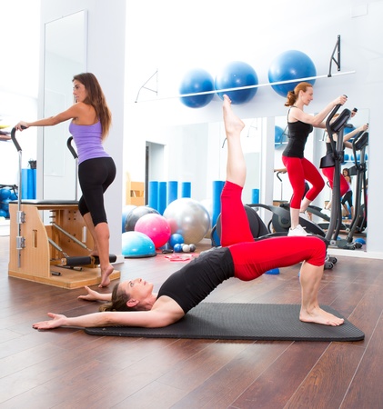 Aerobics pilates gym women group with crosstrainerの写真素材