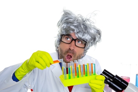 Crazy mad nerd scientist funny expression at laboratory on chemical experimentの写真素材