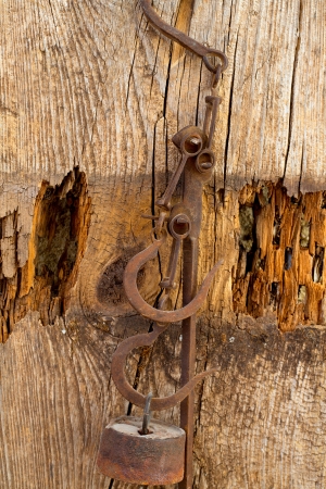 Antique scales rusted iron with weights on vintage backgroundの写真素材