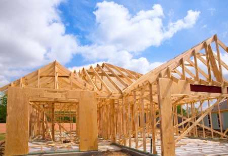 American residential wooden house construction detail in blue sunny day skyのeditorial素材