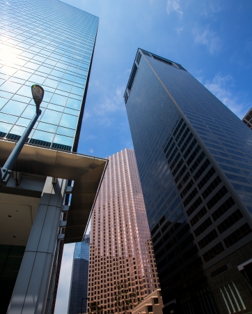 Houston downtown skyscrapers disctict with mirror blue sky reflectionのeditorial素材