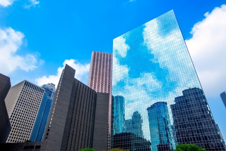 Houston downtown skyscrapers disctict with mirror blue sky reflectionのeditorial素材