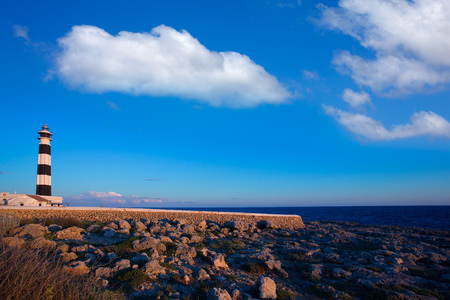 Menorca Cap de Artrutx Lighthouse in southwest cape at Balearic Islandsの写真素材