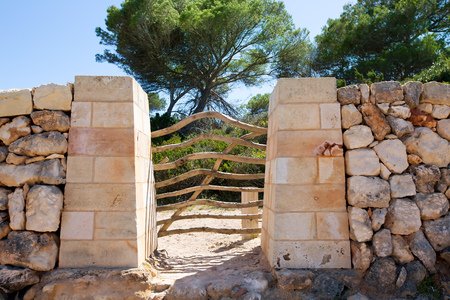 Menorca traditional wooden fence gate in Balearic islands of Spainの写真素材