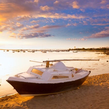 Beached sailboat sunset  Estany des Peix in Formentera Balearic Islands of Spainの写真素材