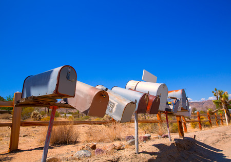 Grunge mail boxes in a row at California Mohave desert USAの写真素材