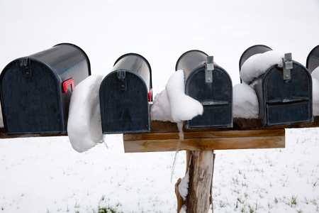 Nevada USA mailboxes in a row with snow and iceの写真素材