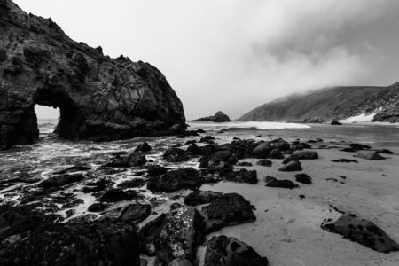 California Pfeiffer Beach in Big Sur State Park dramatic black and white rocks and wavesの写真素材