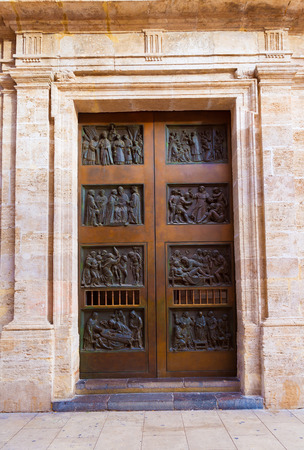 Valencia Basilica Virgen de los Desamparados church door detail in Spainの写真素材