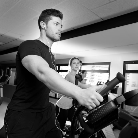 Aerobics elliptical walker trainer group at fitness gym workoutの写真素材