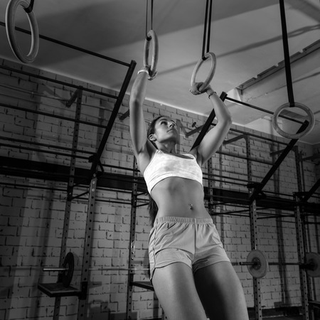 dip ring girl woman muscle ups rings workout at gym