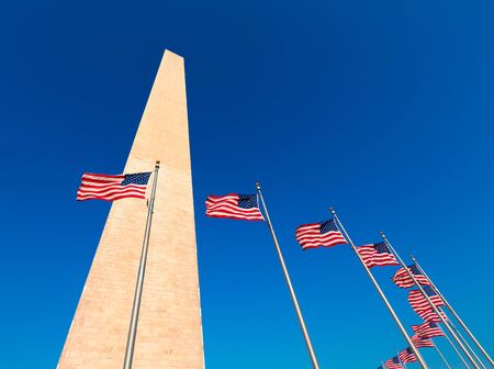 Washington Monument and american flags in District of Columbia DC USAのeditorial素材