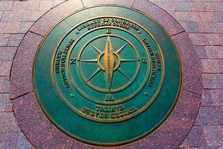 compass symbolic on washington DC ground near Capitol buildingのeditorial素材