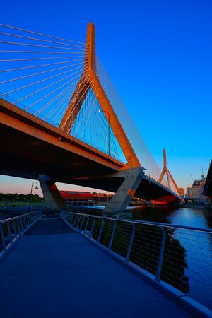Boston Zakim bridge sunset in Bunker Hill Massachusetts USAの写真素材