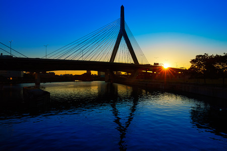 Boston Zakim bridge sunset in Bunker Hill Massachusetts USAの写真素材