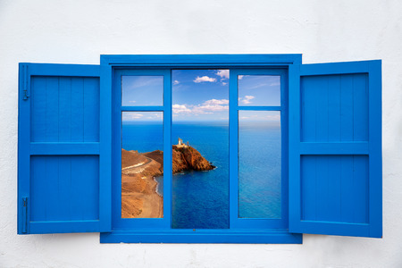 Almeria view from blue window of Cabo de Gata lighthouse photo mountの写真素材