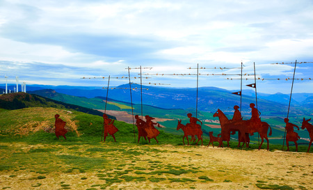 The way of Saint James Alto del Perdon top with steel sculpture of pilgrims at Navarraの写真素材