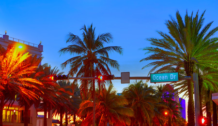 Miami Beach South Beach sunset in Ocean Drive sign Florida