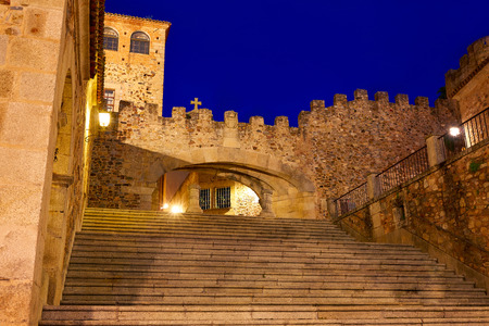 Caceres Arco de la Estrella Star arch sunset in Spain entrance to monumental cityの写真素材