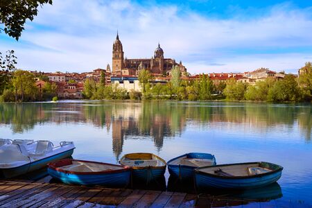 Salamanca skyline with Tormes river boats in Spainの写真素材