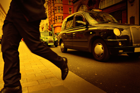 London Taxi at Oxford Street W1 Westminster in UK Englandのeditorial素材