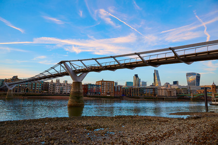 London Millennium bridge sunset skyline in UK at duskの写真素材