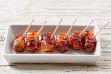 pinchos Bacon wrapped dates pintxos tapas from Spain foodの写真素材
